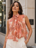 Abstract print tie neck top