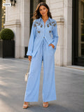 Embellished button up blouse with relaxed wide trousers