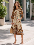 Button up long sleeve pleated floral midi dress with matching belt