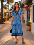 Wrap v neck polka dot pleated midi dress with matching belt